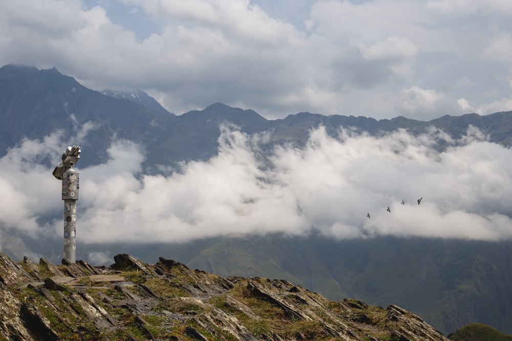 a statue on a mountain