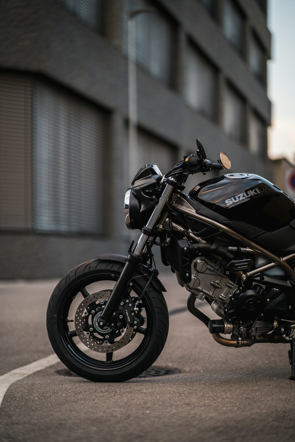 a motorcycle parked in front of a building