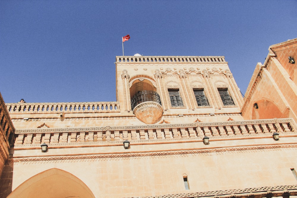 a building with a flag on top