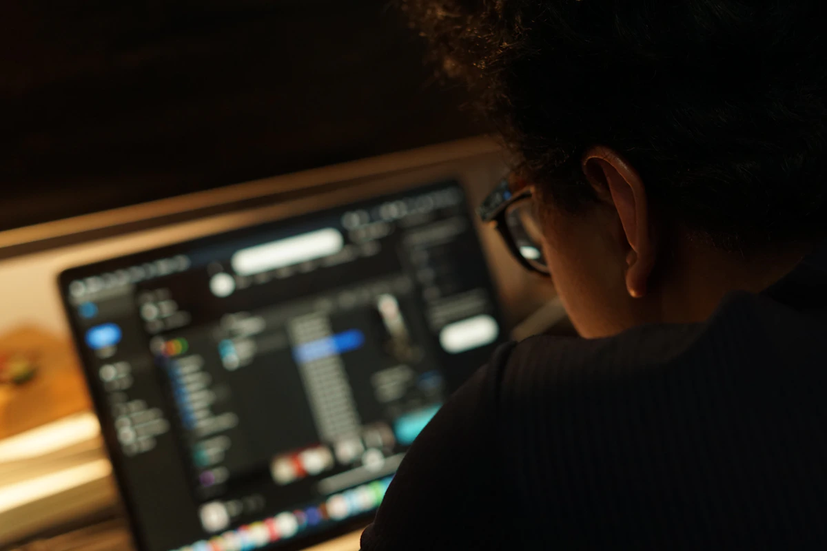 Person working focused at computer screen