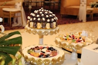A beautifully arranged table featuring an assortment of confectionery.