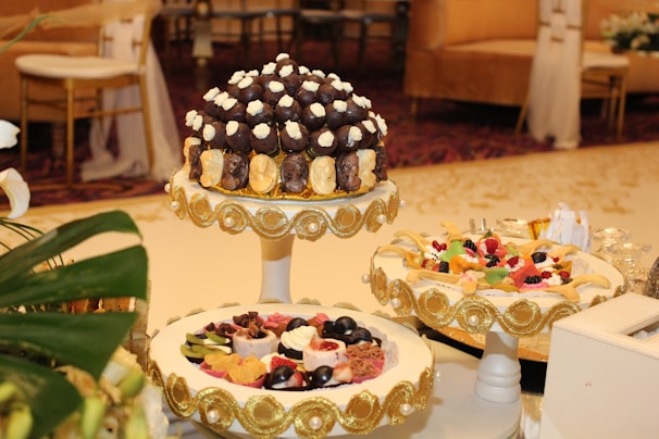 A beautifully arranged dessert table featuring elegant pastries and sweets.