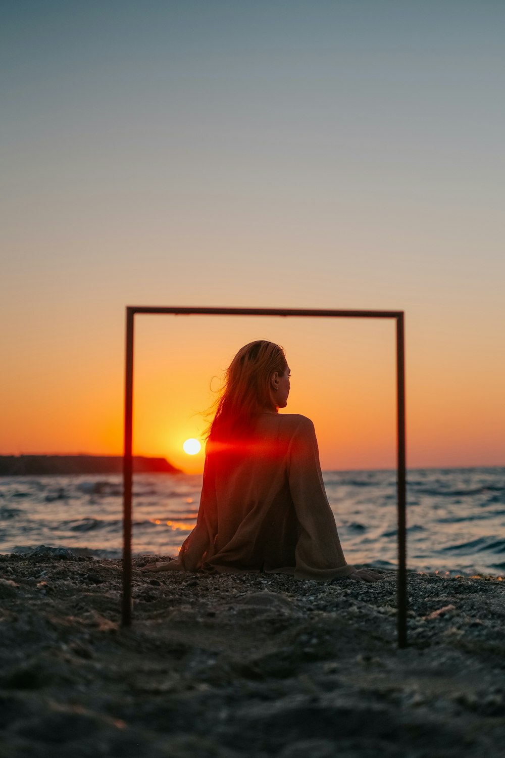 a person sitting on a beach