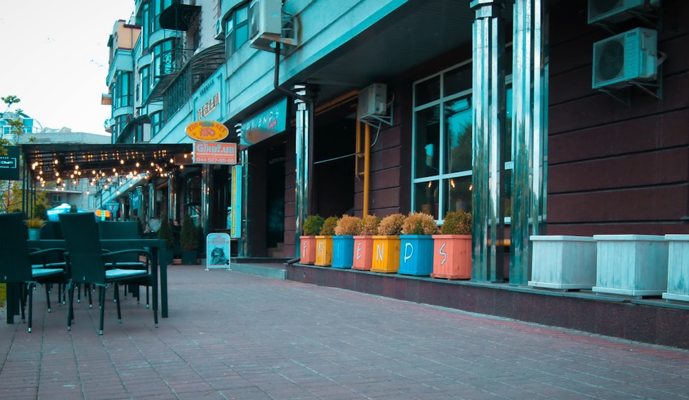 a street with chairs and tables