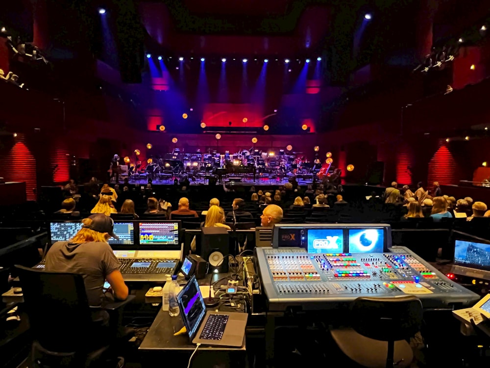 a room full of people with computers