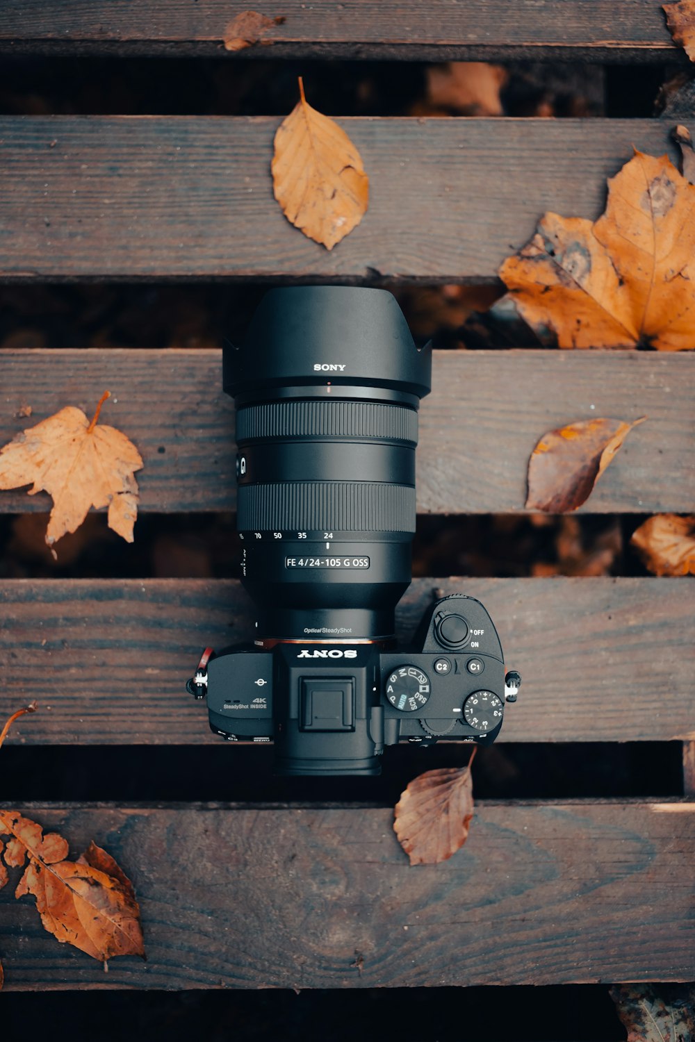 a camera on a wood surface