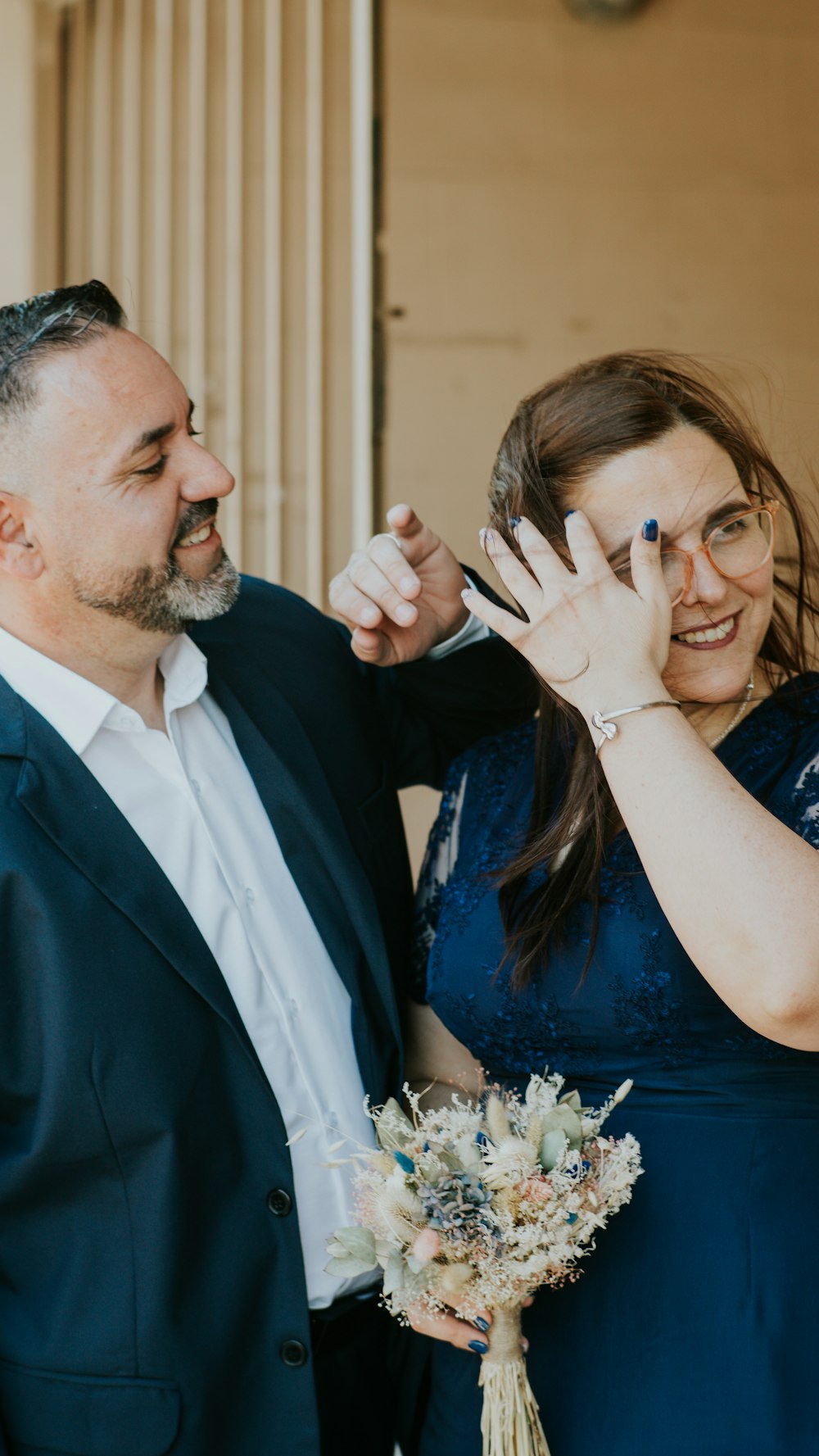 a man and woman smiling