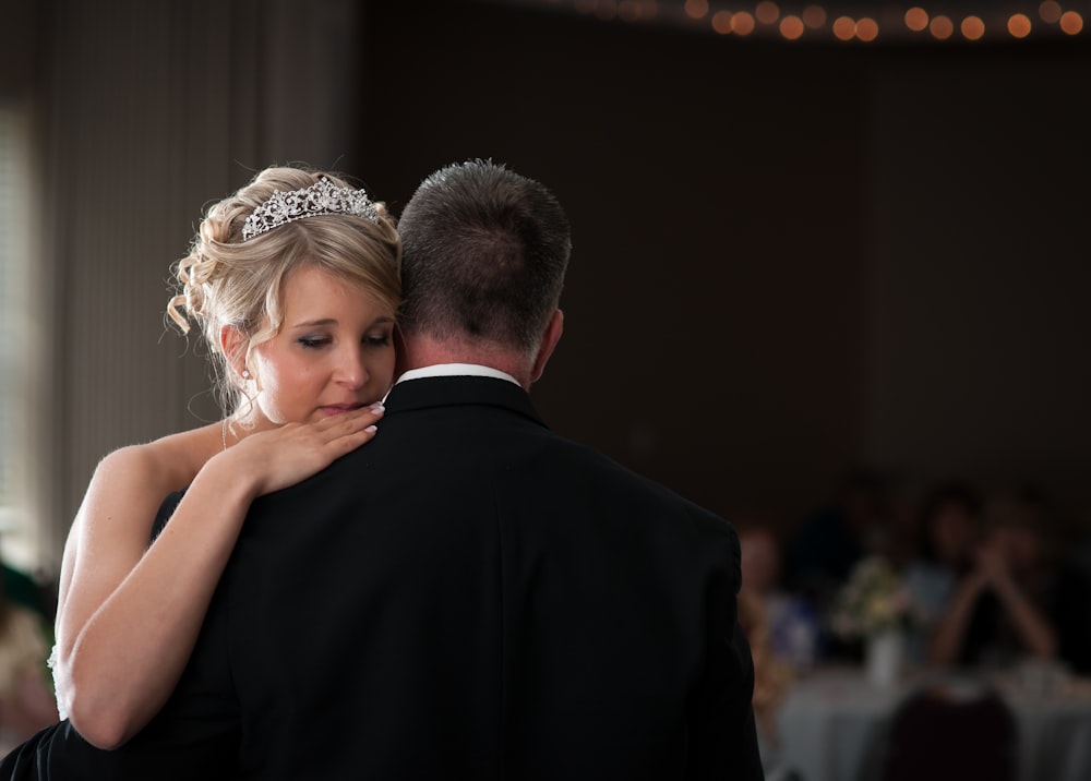 a man and woman kissing