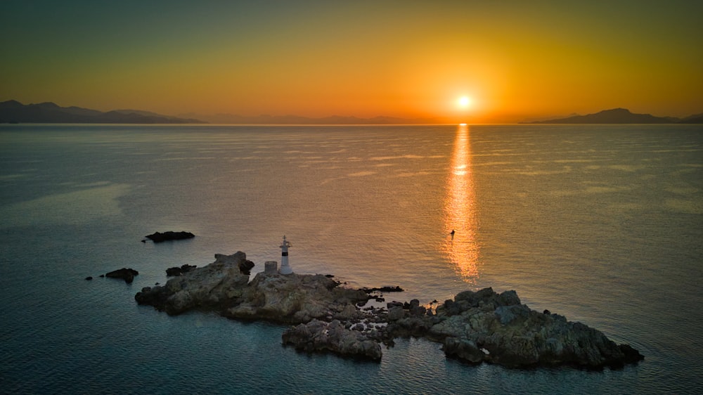 a lighthouse on a rocky shore