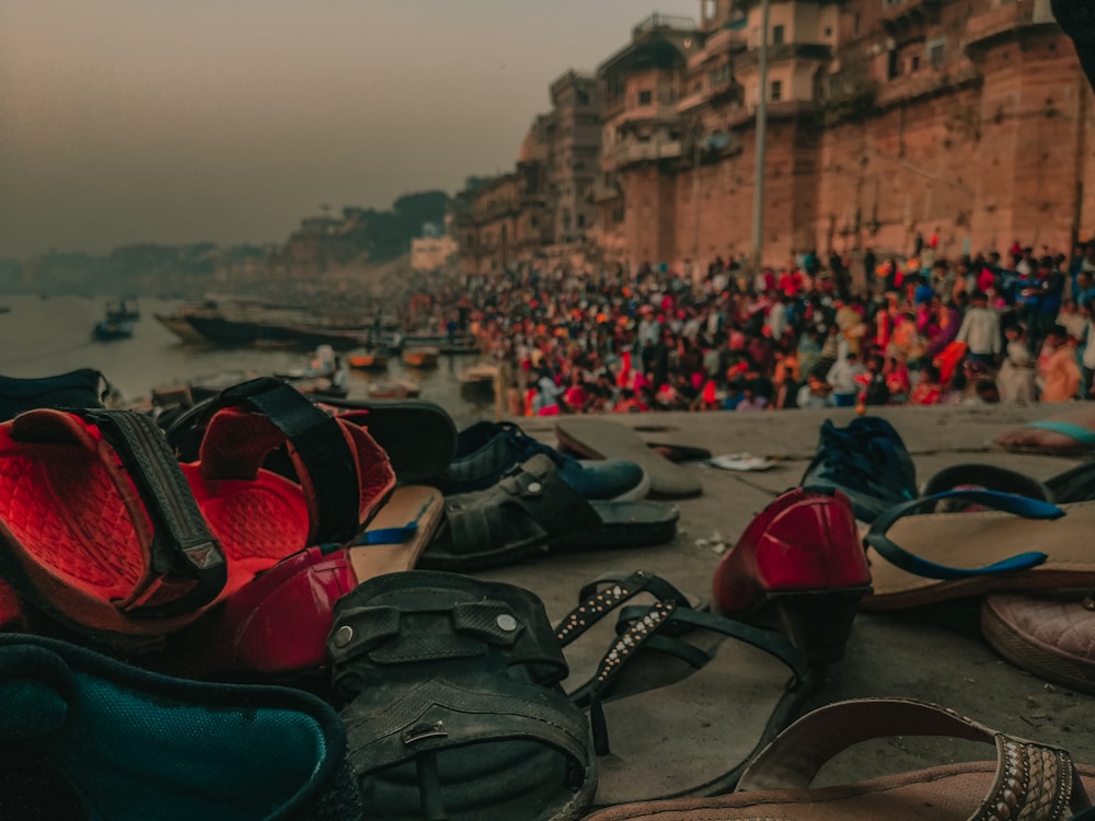 a group of shoes on a beach