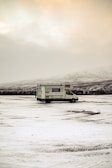 The camper van covered lightly in morning frost at a remote spot in Mexico.