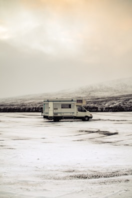 The camper van covered lightly in morning frost at a remote spot in Mexico.
