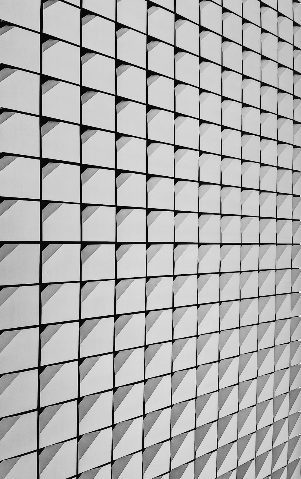 a white and black tiled wall