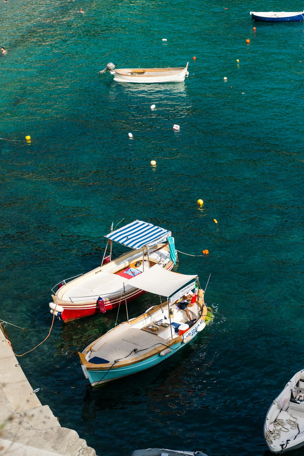 boats are floating in the water