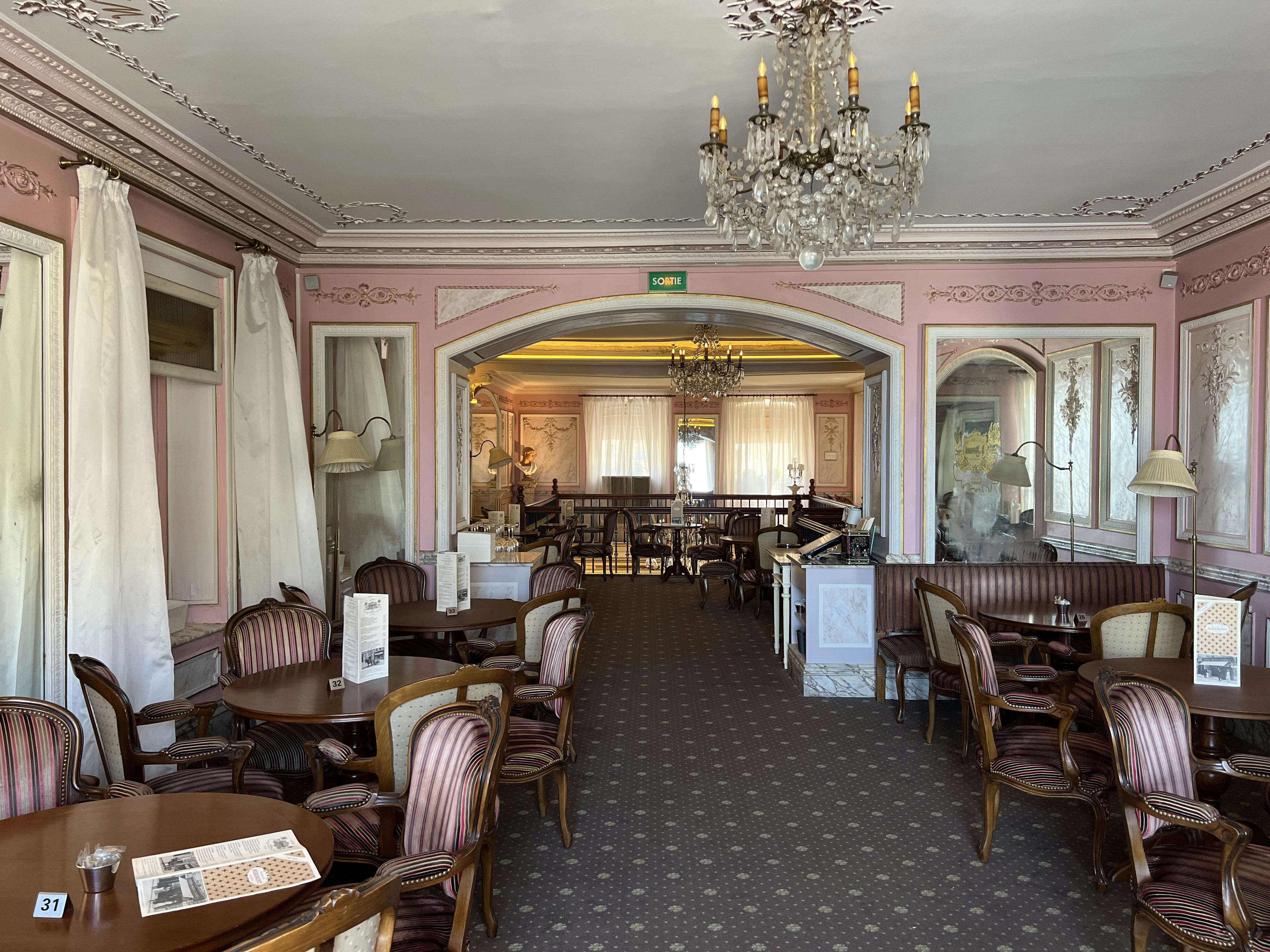 a large room with tables and chairs