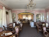 a large room with tables and chairs