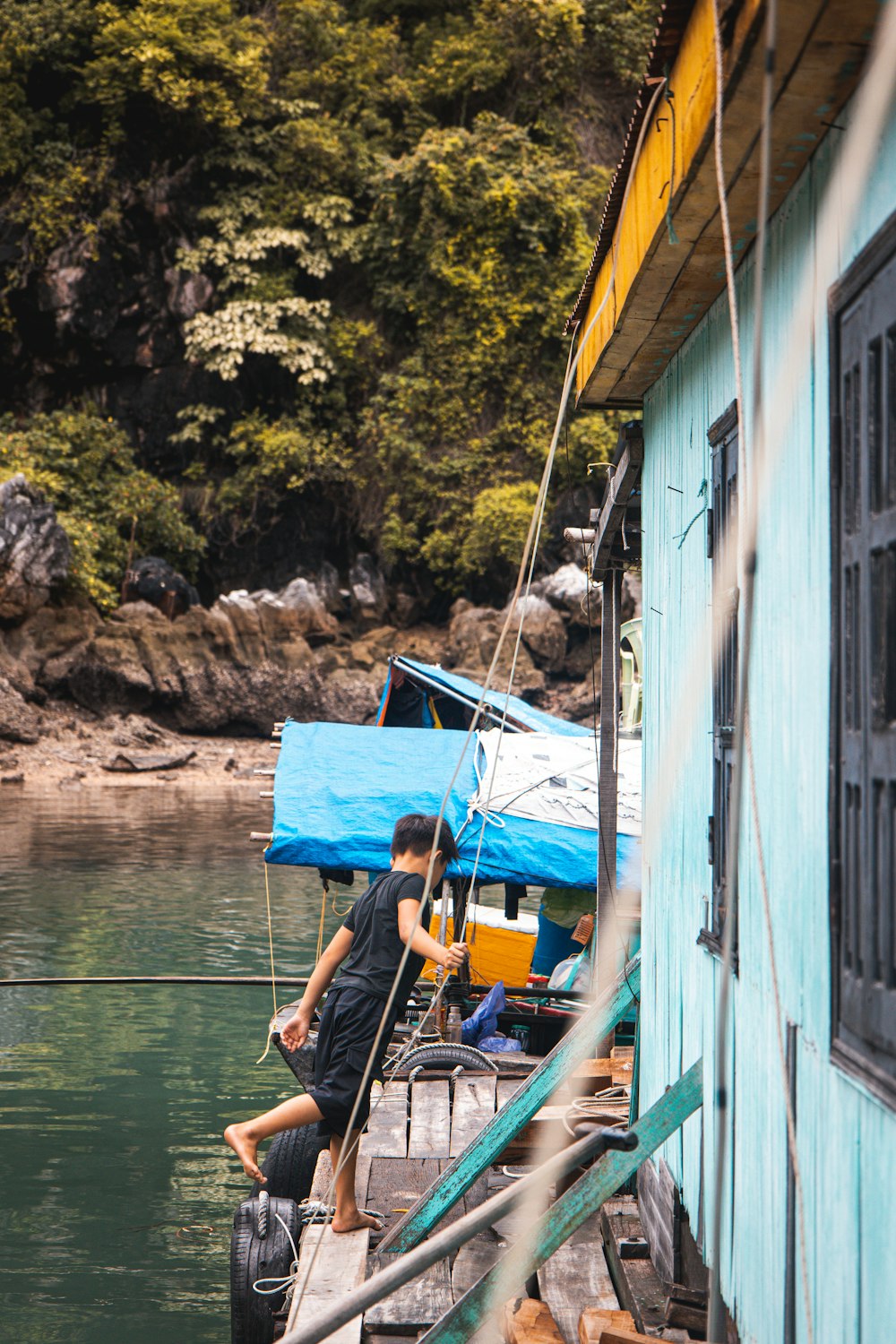 a man sitting on a boat