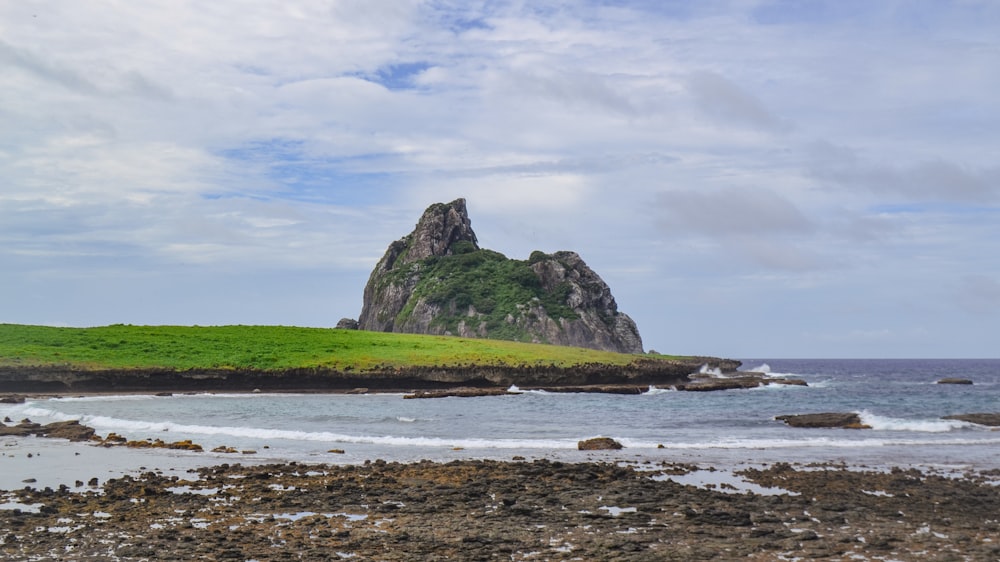 a rocky island in the ocean