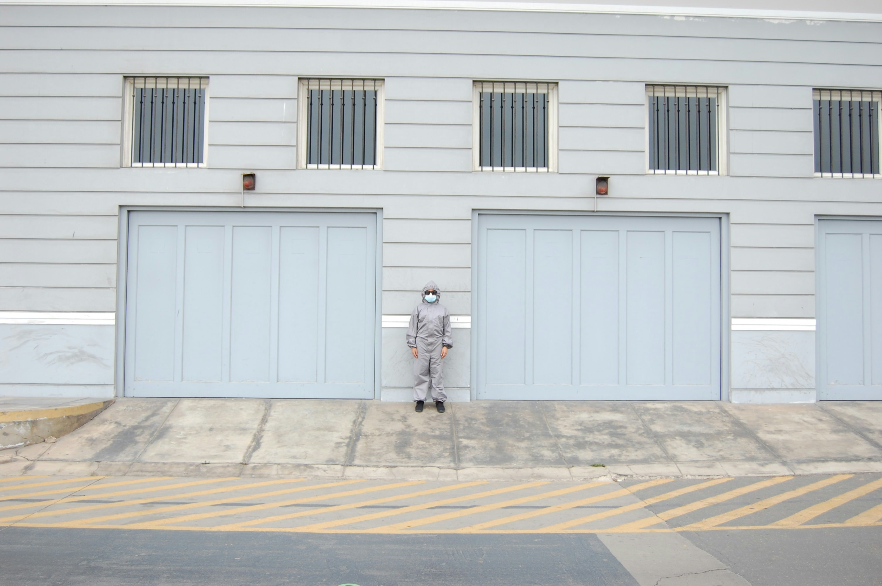 a person walking on a sidewalk