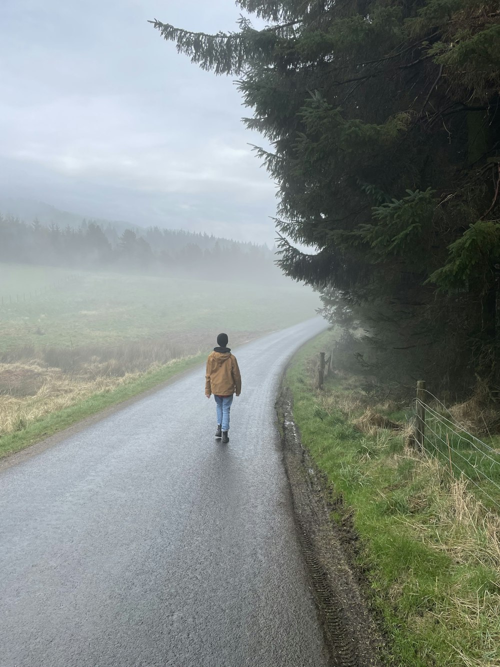 a person walking on a road