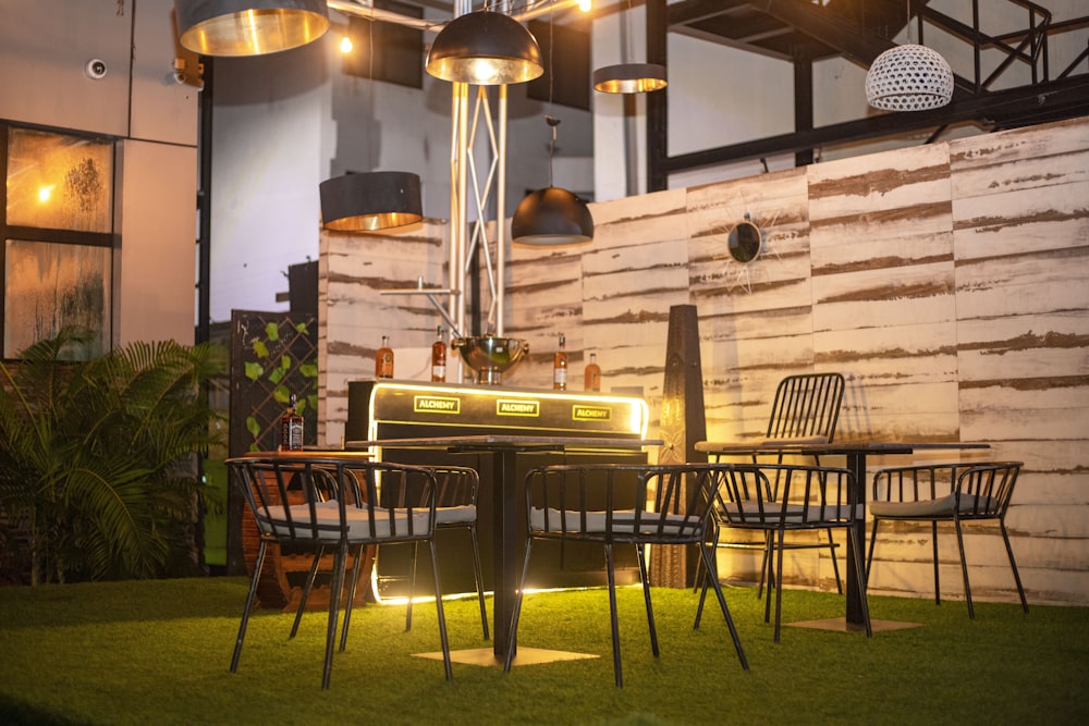 a table with chairs and a light