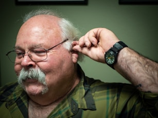 elderly gentleman with hearing aids