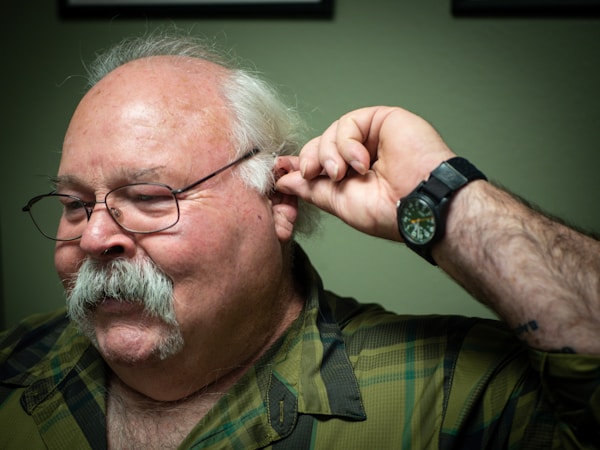 elderly gentleman with hearing aids