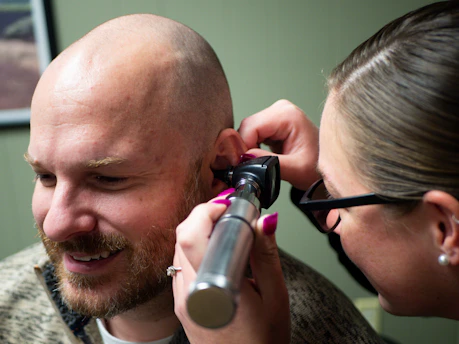 a man talking on a cell phone