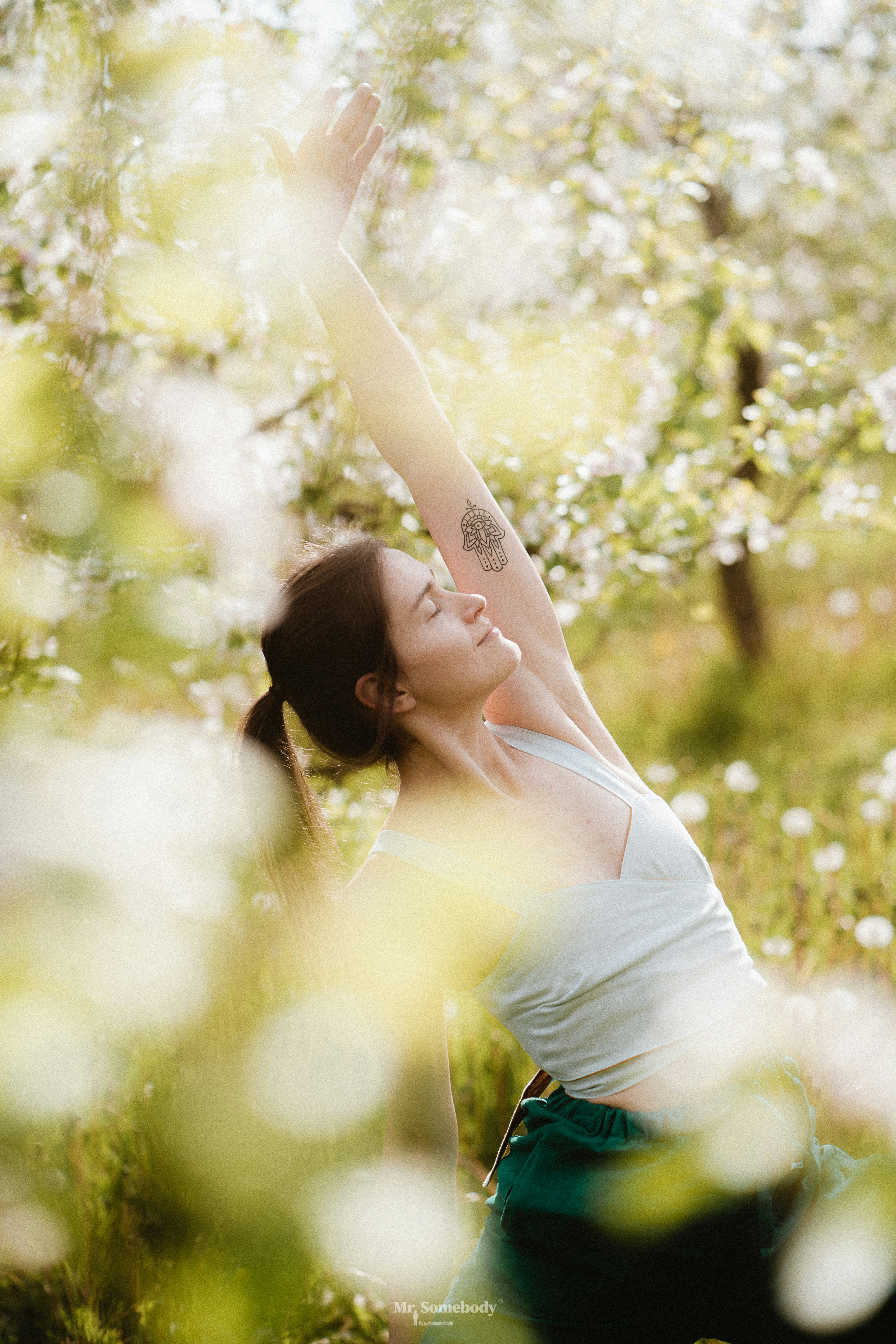 a person with the arms up