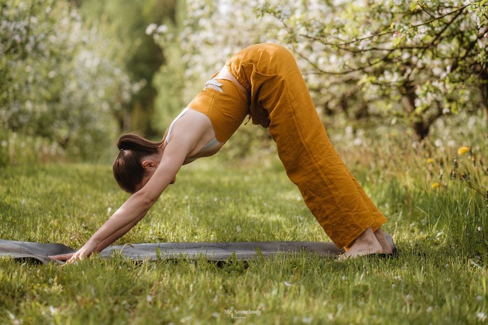 a person doing yoga outside