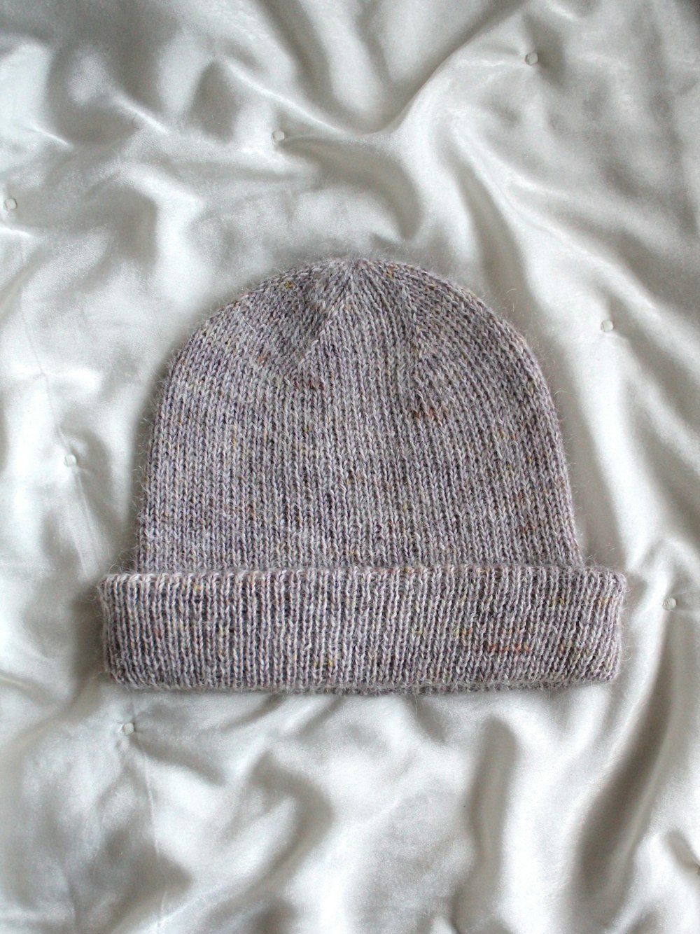 a brown knit hat