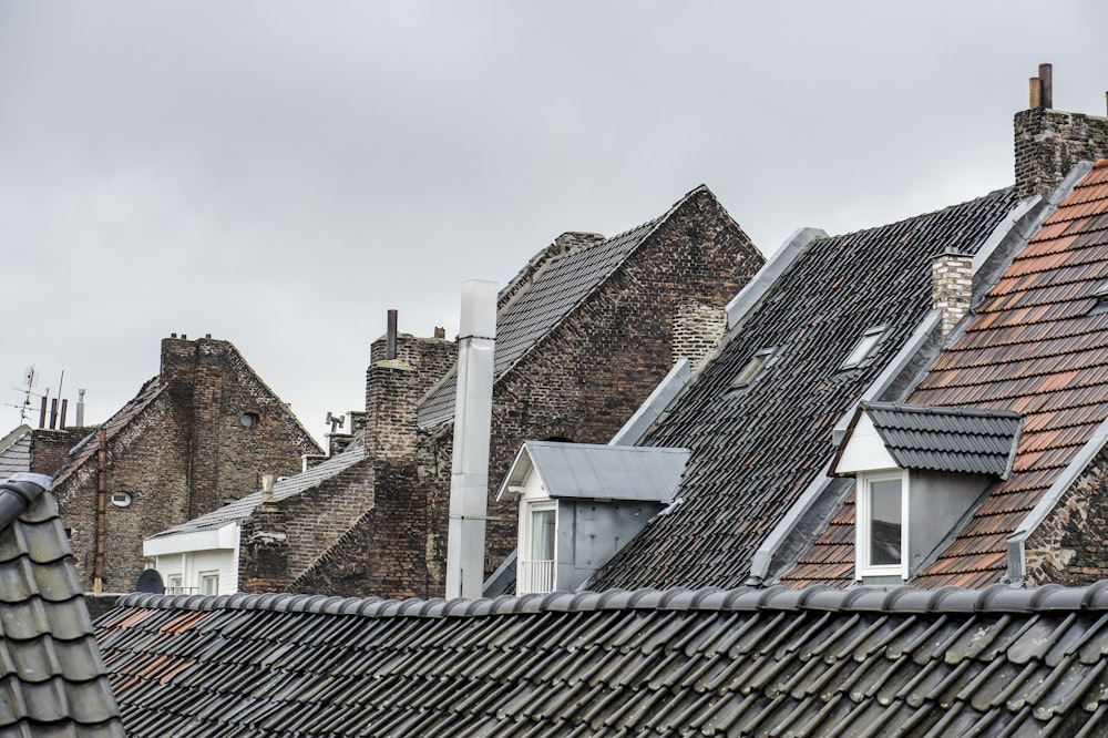 a group of rooftops with a chimney