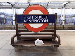 a bench with a sign on it