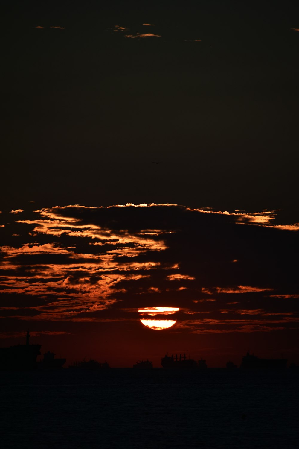 a sunset over a city