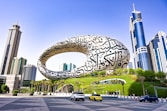 a large reflective sphere in a city