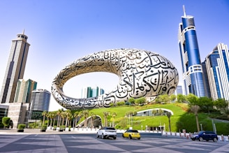 a large reflective sphere in a city