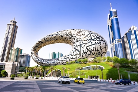a large reflective sphere in a city