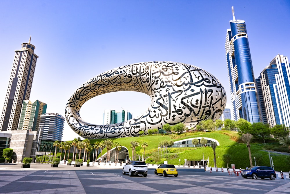 a large reflective sphere in a city