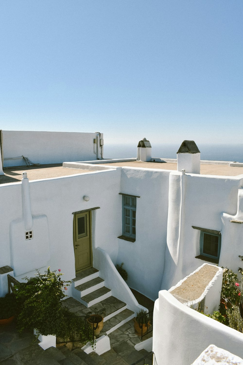 a white house with a staircase