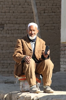 a man sitting on a bench