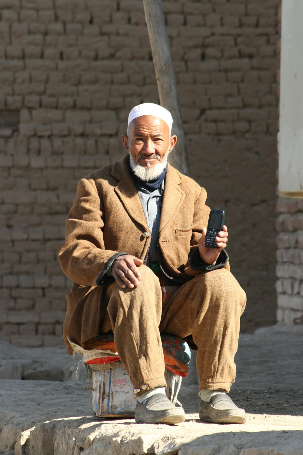 a man sitting on a bench