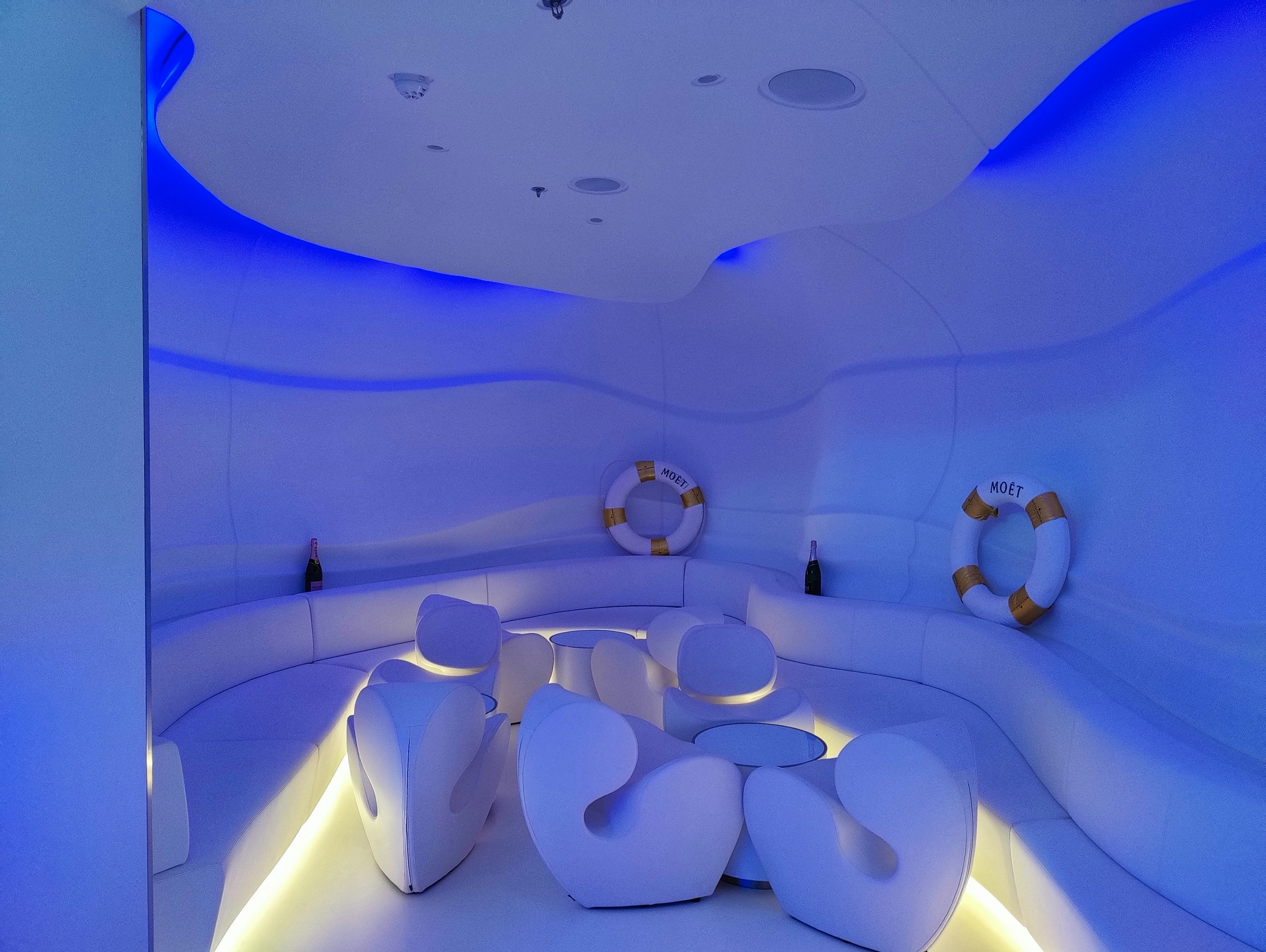 a room with a table and chairs, 