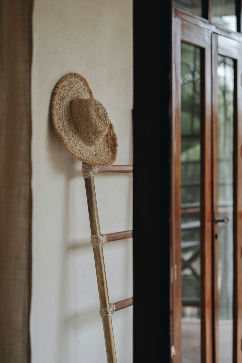 a wooden stick with a round object on it