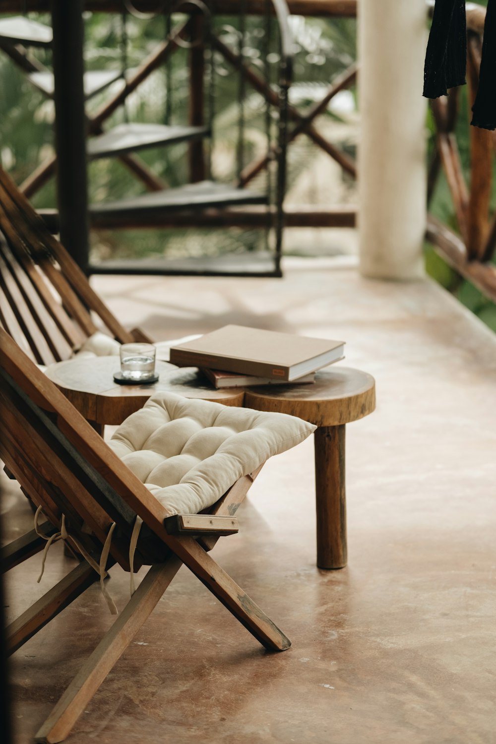 a wooden bench with a pillow