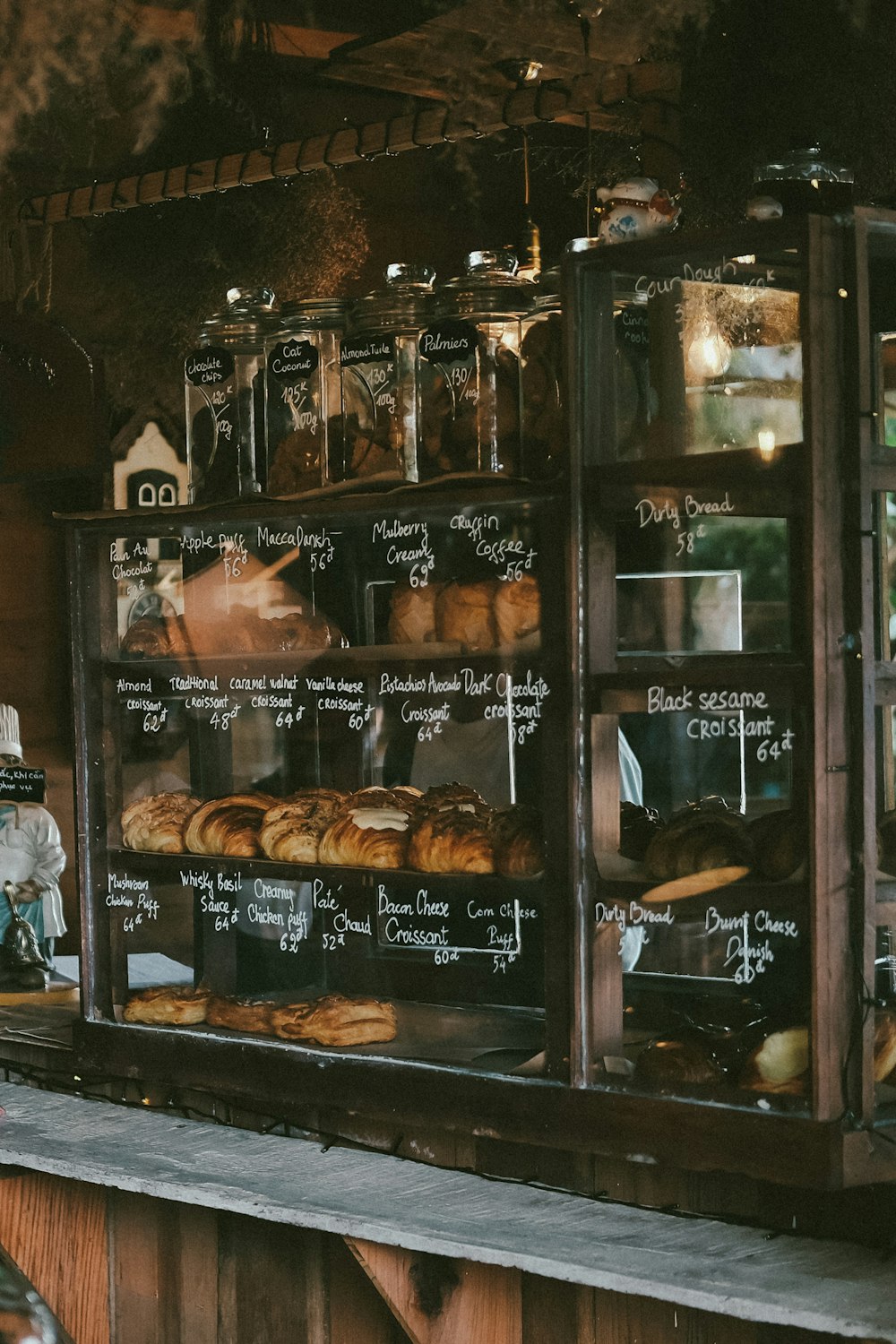 a bakery window with donuts