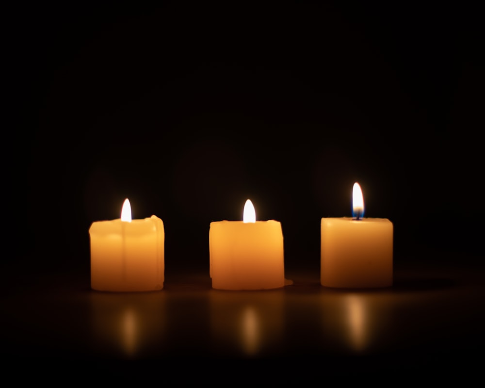 a group of lit candles