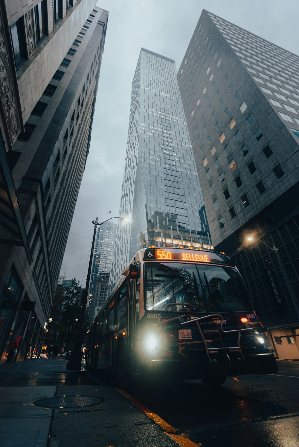 a bus driving through a city