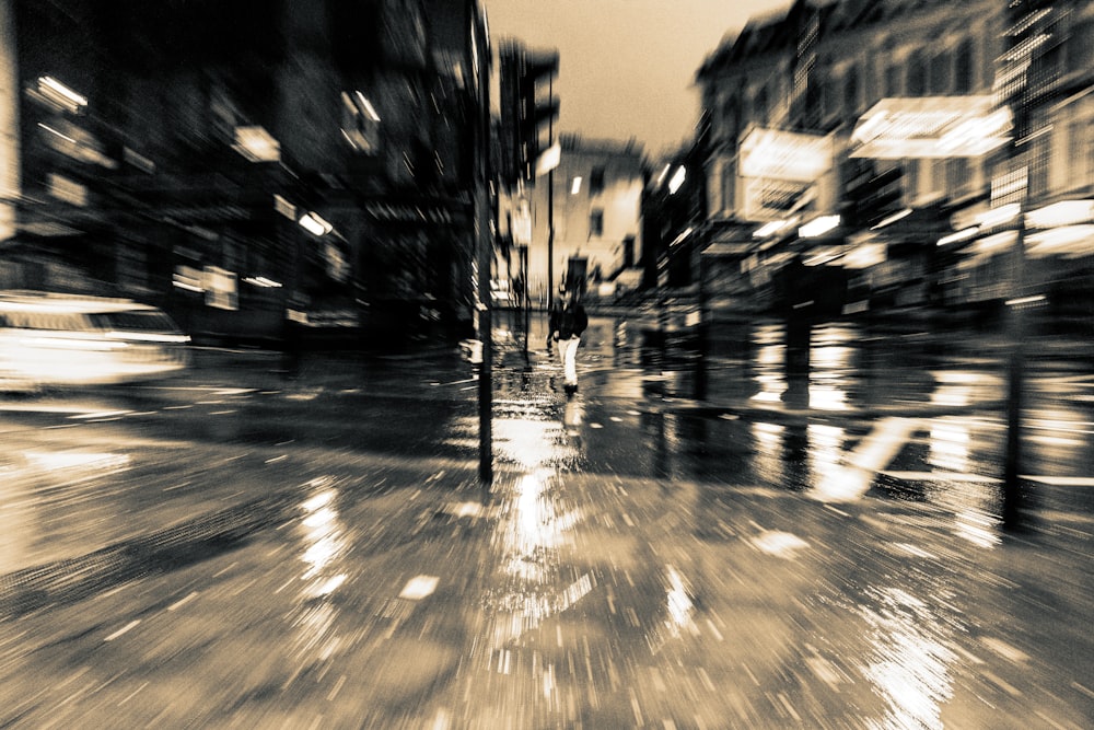a person walking on a wet street