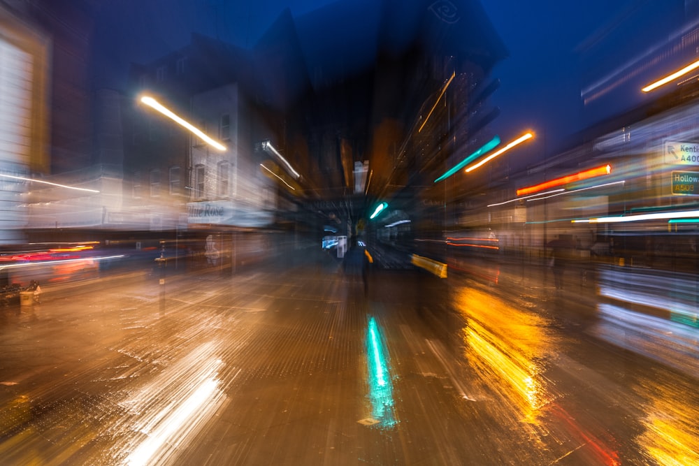 a street with cars on it at night