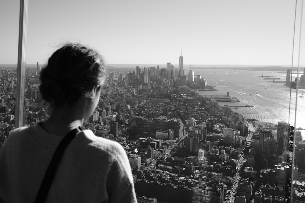 a man looking out over a city